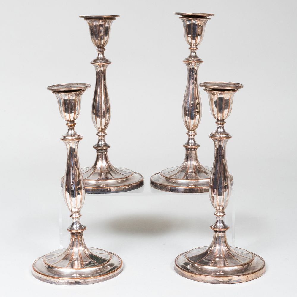 Appraisal: Set of Four Sheffield Plate Candle Sticks with Circular Bases