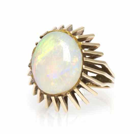 Appraisal: A Karat Yellow Gold and Opal Ring containing one oval