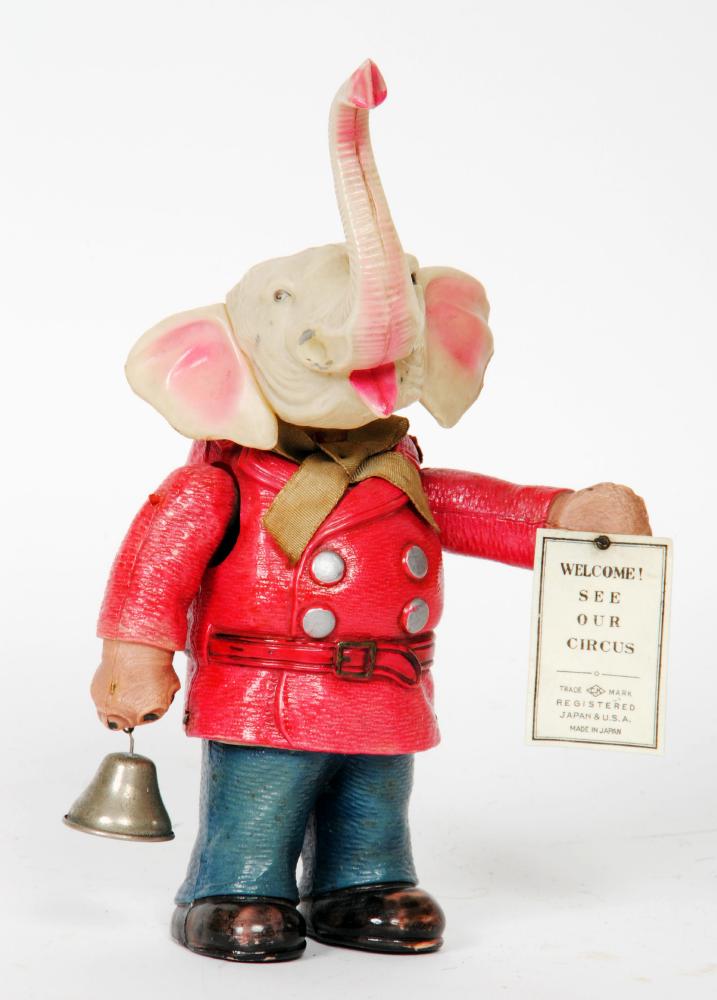 Appraisal: A Japanese circus elephant ringmaster celluloid construction clockwork operated with