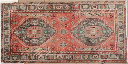 Appraisal: A Qashqai carpet modern the pale red field with stylised