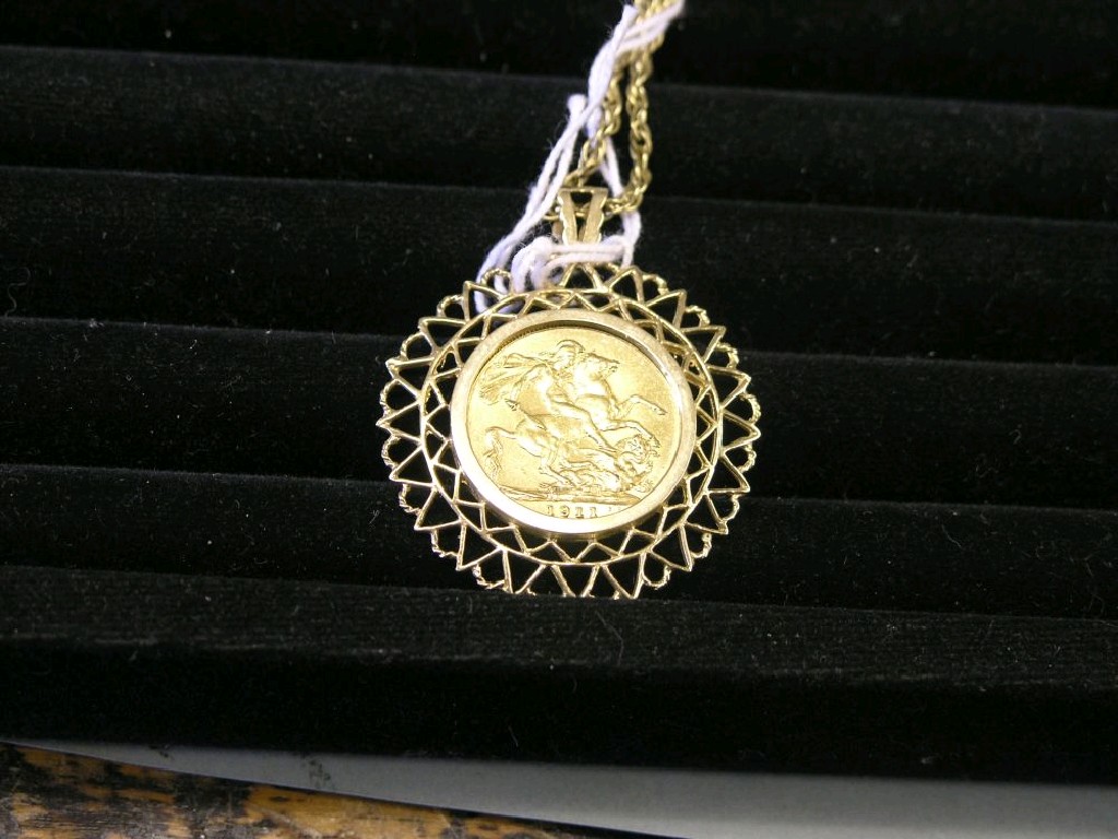 Appraisal: A gold sovereign within ct gold pendant mount