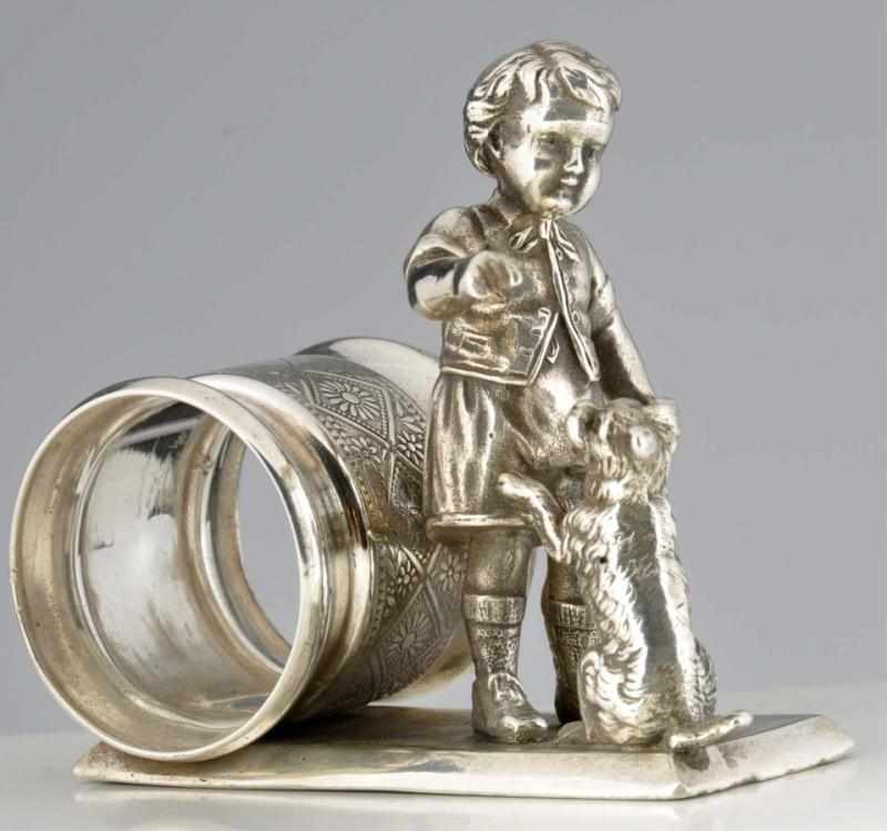 Appraisal: Child Feeds Begging Dog Figural Napkin Ring By Meriden Britannia