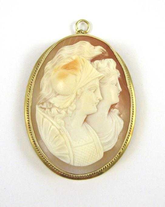 Appraisal: VICTORIAN DOUBLE PORTRAIT CAMEO PENDANT with an oval relief carved