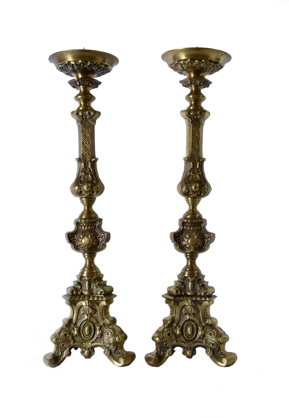 Appraisal: PAIR OF BAROQUE STYLE BRASS ALTAR STICKSModern Cast allover with