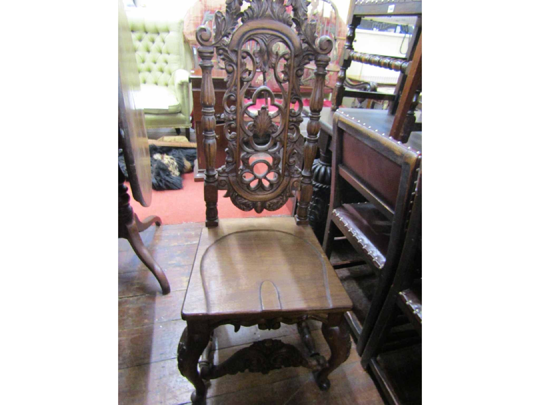 Appraisal: A single Carolean style side chair with carved and pierced