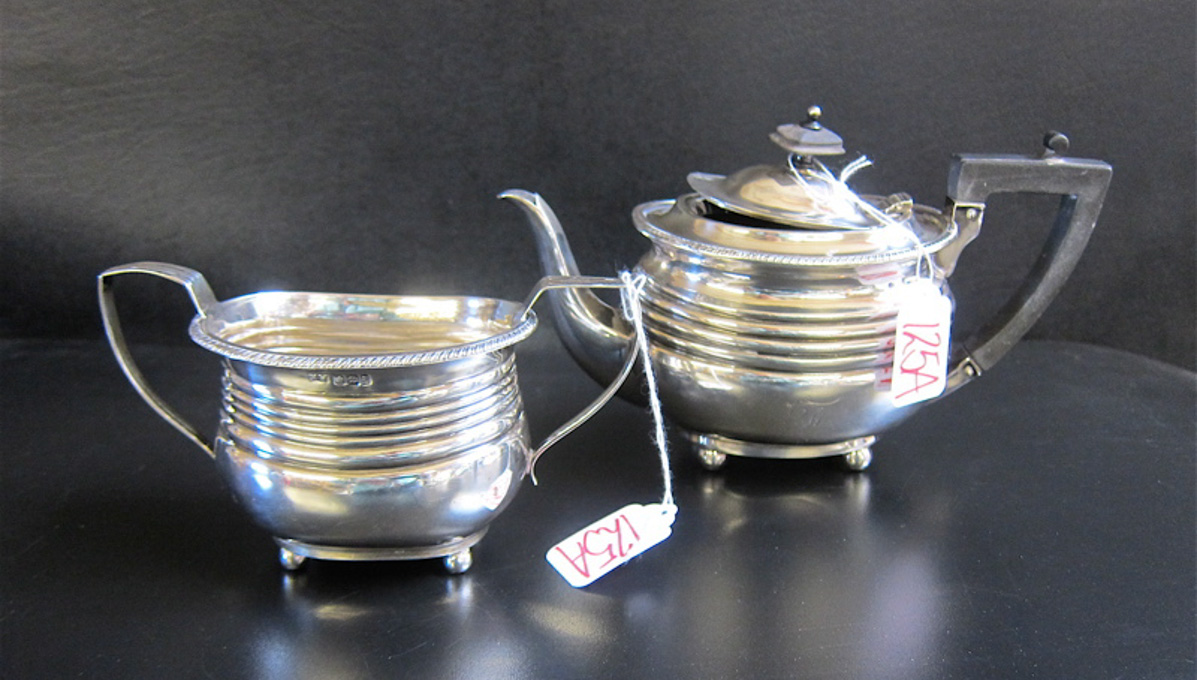 Appraisal: ENGLISH STERLING SILVER TEAPOT AND SUGAR BOWL SET two pieces