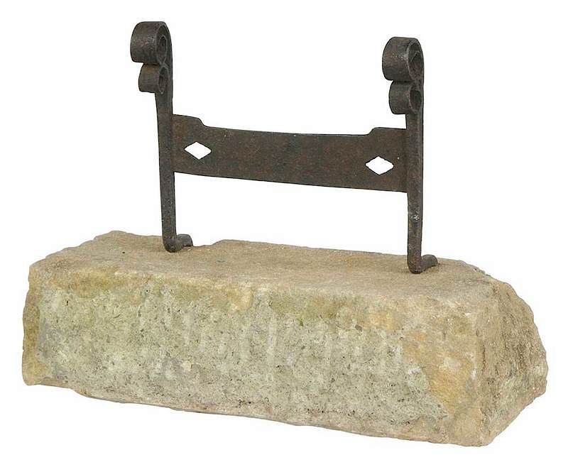 Appraisal: American Limestone Wrought Iron Footscraper th century scrolled pierced ironwork