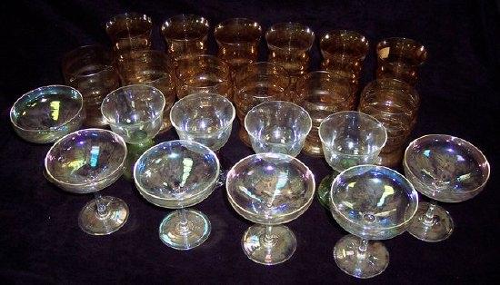 Appraisal: A set of six champagne glasses of iridescent colour and