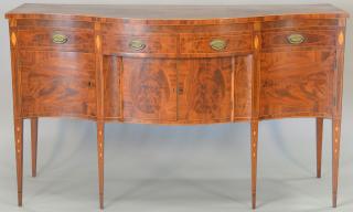 Appraisal: Federal mahogany sideboard having serpentine top over conforming case having