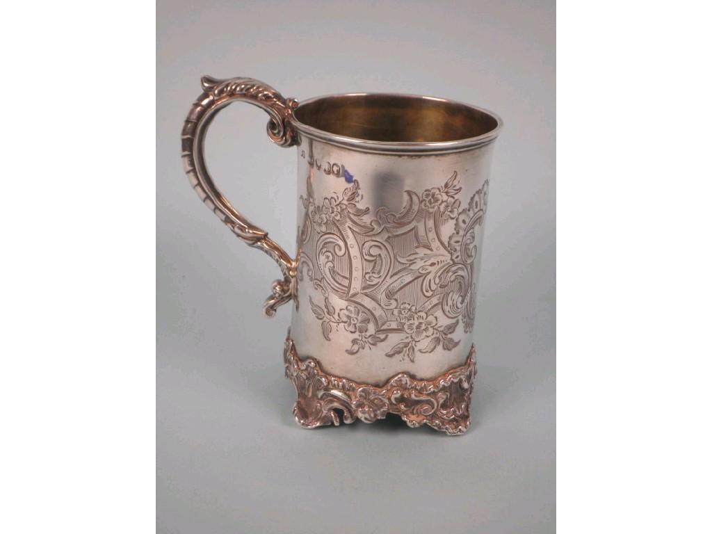 Appraisal: A Victorian silver christening mug engraved with foliate scrolls and