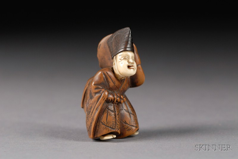 Appraisal: Ivory and Wood Netsuke th century manju dancer wooden body