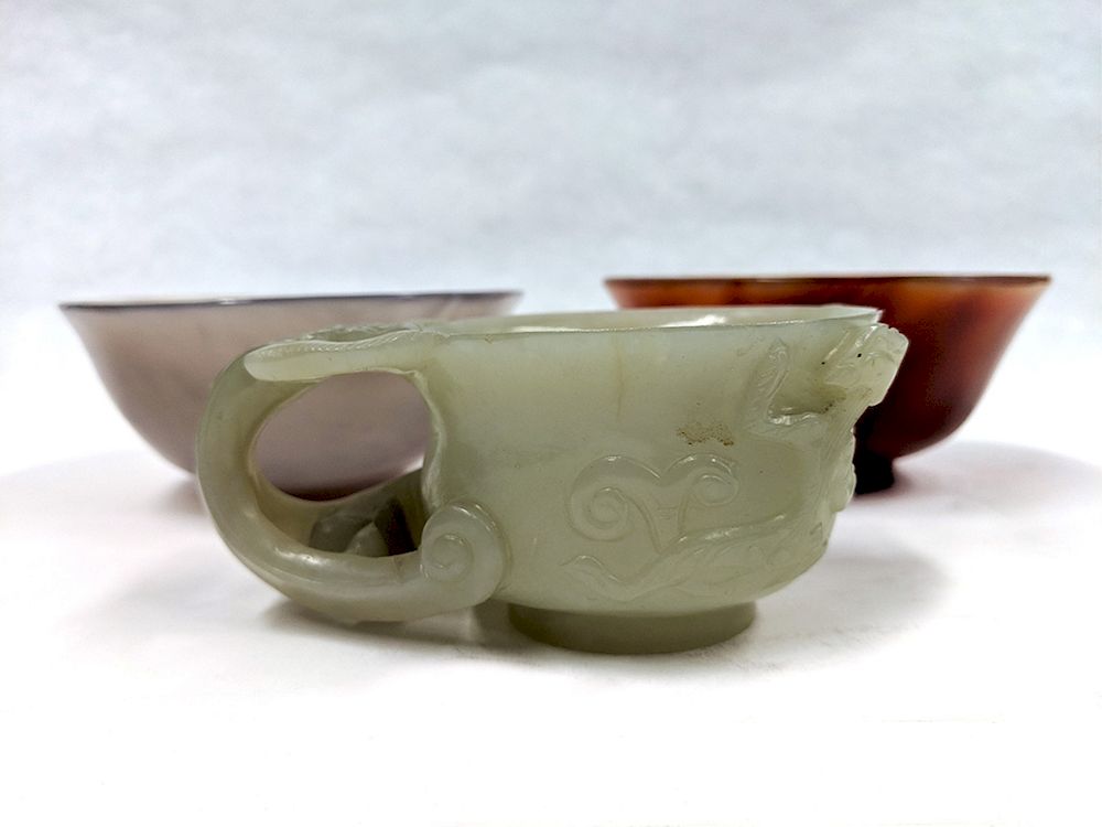 Appraisal: Celadon Jade Carved 'Chilong' Libation Cup and Two Stone Bowls