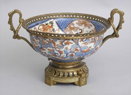 Appraisal: JAPANESE IMARI BOWL WITH LOUIS XVI-STYLE GILT-BRONZE MOUNTS The bowl