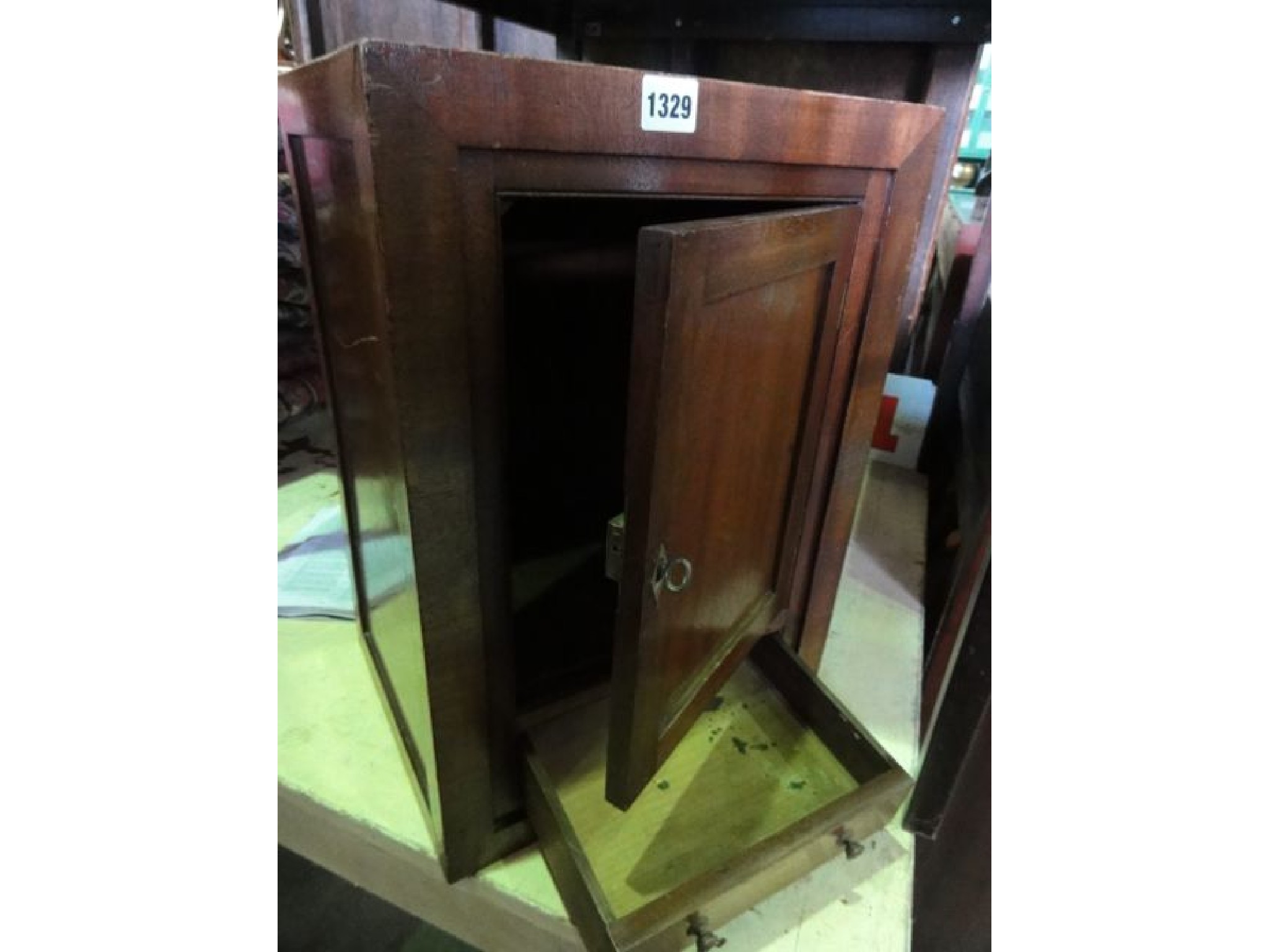 Appraisal: A small th century mahogany cabinet of square cut form