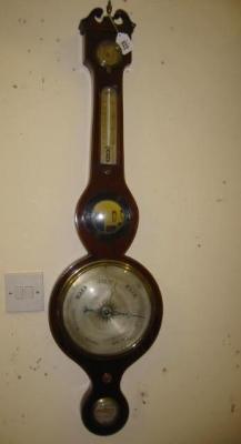 Appraisal: A FIVE GLASS WHEEL BAROMETER with detachable thermometer in mahogany