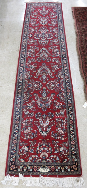 Appraisal: SIGNED AND HAND KNOTTED ORIENTAL RUNNER Pakistani Sarouk overall floral