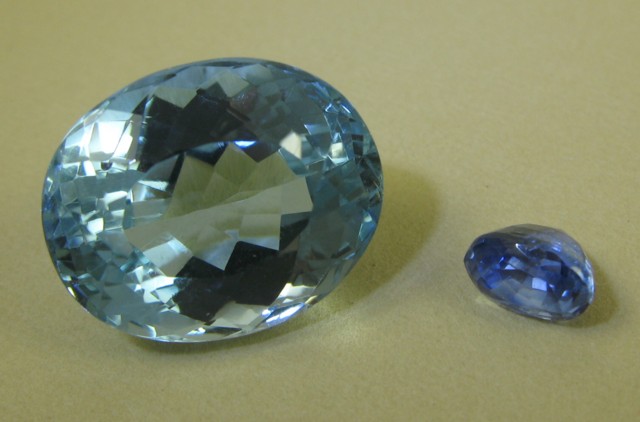 Appraisal: TWO UNSET GEMSTONES oval mixed-cut blue topaz cts oval mixed-cut