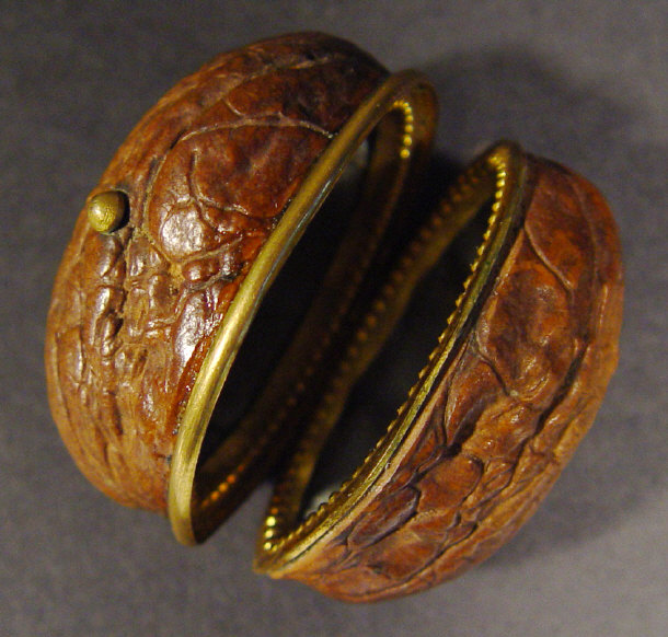 Appraisal: th Century walnut jewellery box with gold metal mounts and