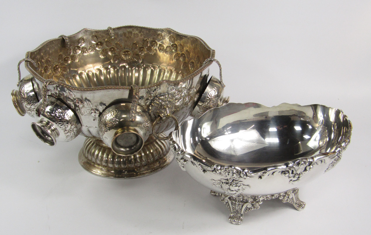 Appraisal: A silver plated Monteith with lion's head and ring handles