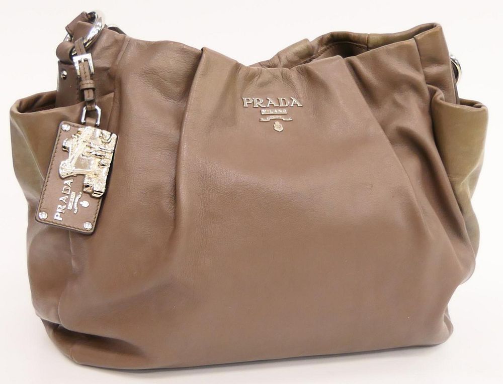 Appraisal: PRADA TAUPE LAMB SKIN HEAVY MATCHING STRAP HANDLE Bag measures