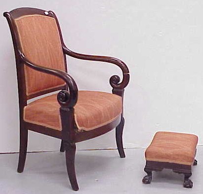 Appraisal: Open armchair with arched crest scrolled arms saber legs orange