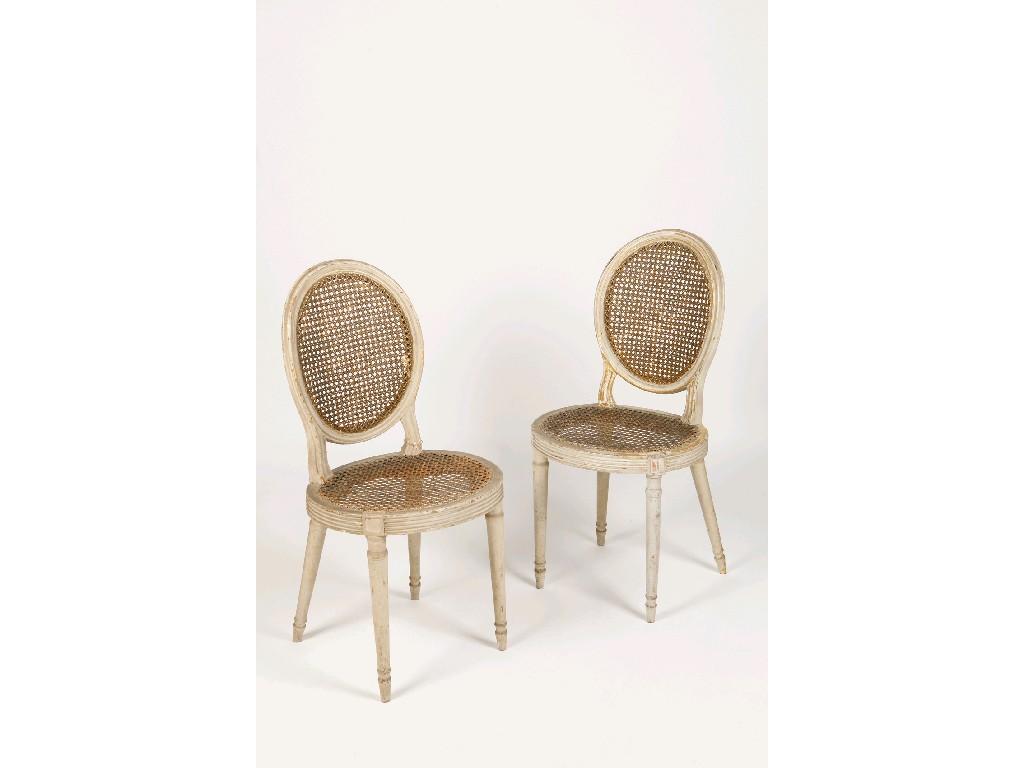 Appraisal: A PAIR OF LOUIS XVI GREY PAINTED AND GILT SALON