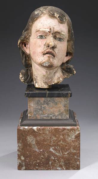 Appraisal: A Continental carved and polychrome decorated head of Christ th