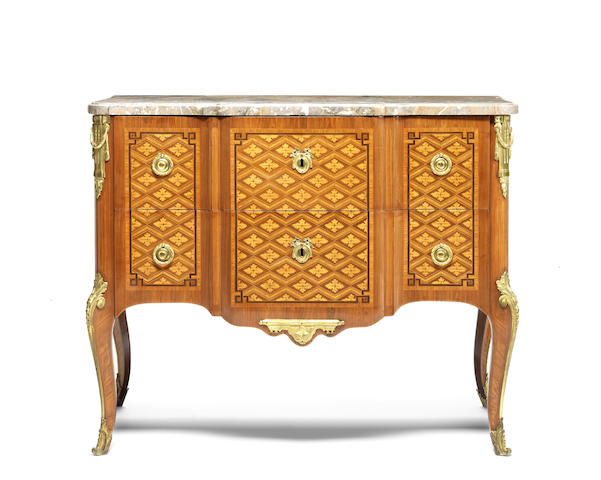 Appraisal: A French Louis XV XVI Transitional ormolu-mounted parquetry commode in