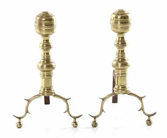 Appraisal: Pair Classical brass andirons th century bulbous turned finial leading