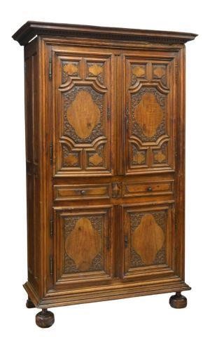 Appraisal: French carved cupboard late th c having a protruding cornice