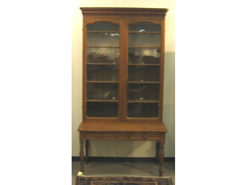 Appraisal: AMERICAN TH CENTURY WALNUT BOOKCASE ON DESK Bookcase with molded