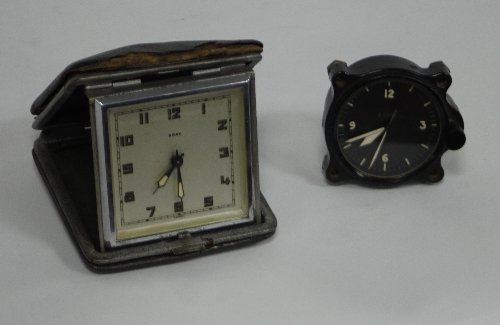 Appraisal: A Le Coultre and Co eight-day car clock with white