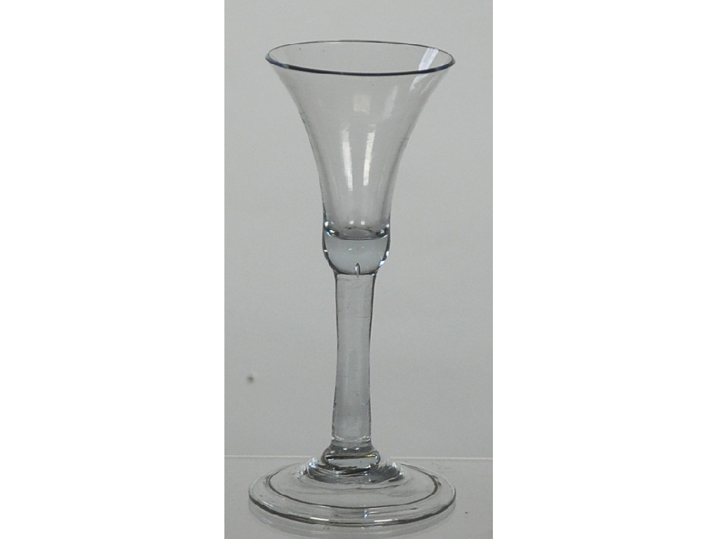 Appraisal: EIGHTEENTH CENTURY DRINKING GLASS with bell shape bowl and plain