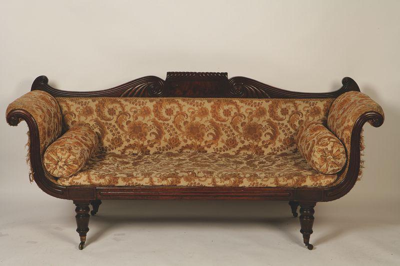 Appraisal: A WILLIAM IV MAHOGANY SOFA with a removable back panel