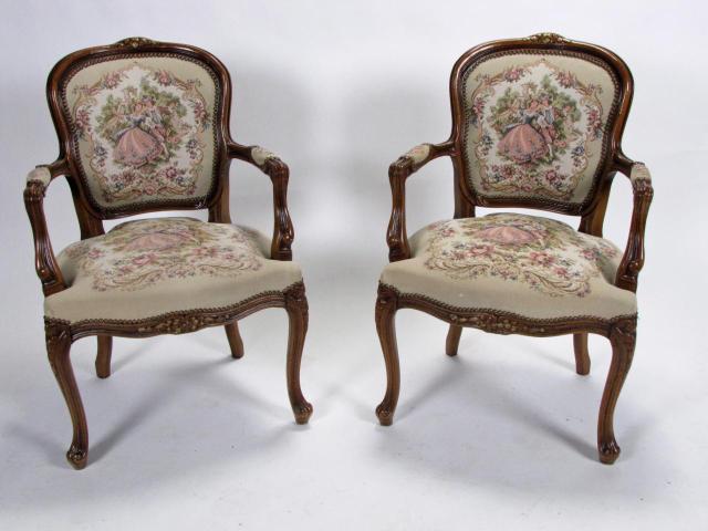 Appraisal: Pair of French Style armchairs with tapestry scenic upholstery floral