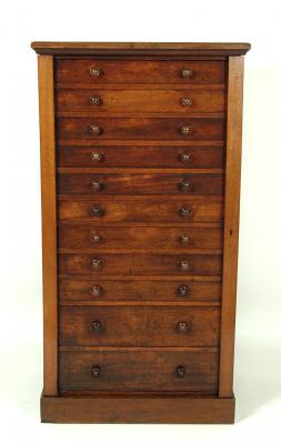 Appraisal: AN OAK WELLINGTON CHEST by Marsh Jones Cribb the moulded