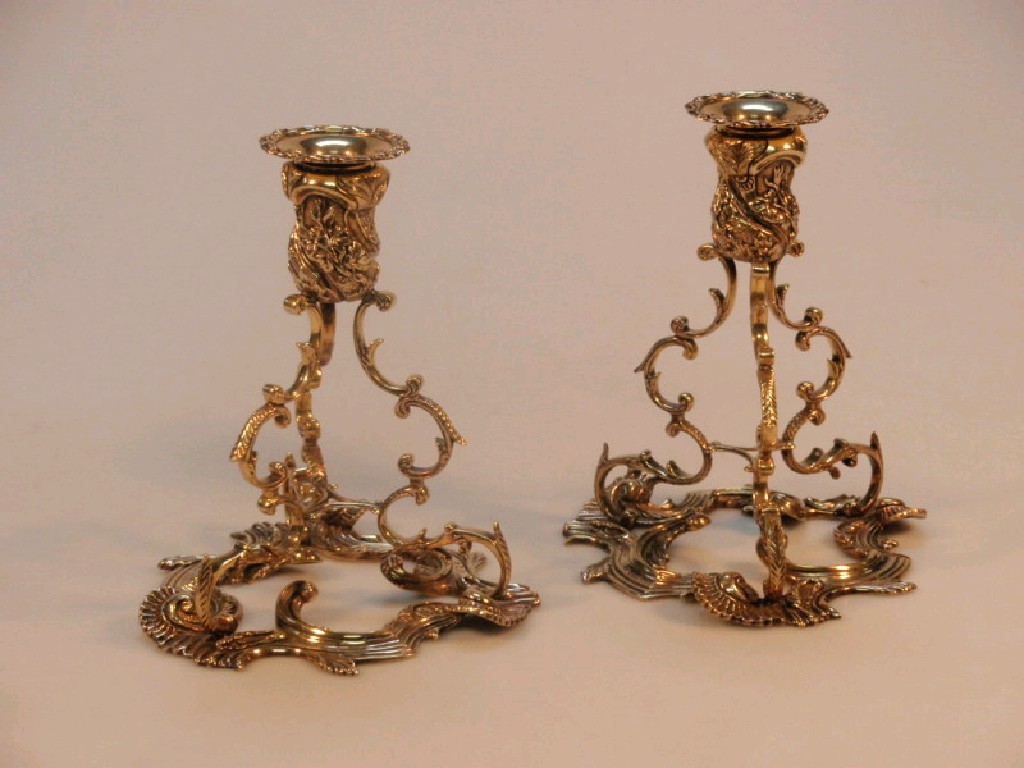 Appraisal: A pair of Irish silver gilt rococo candlesticks by the