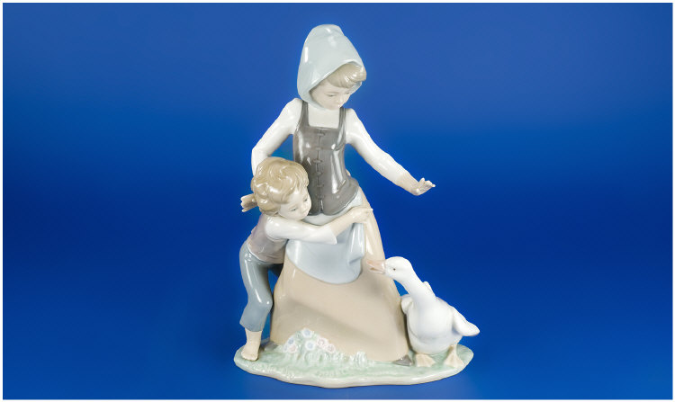 Appraisal: Lladro Figure 'boy and girl with goose' inches in height