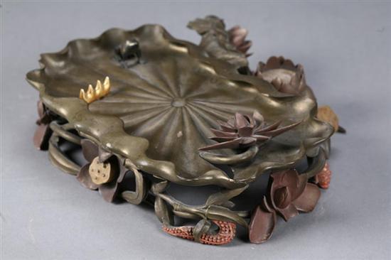 Appraisal: LILY PAD BRUSH REST Asian late th-early th century lacquered