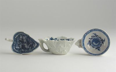 Appraisal: Three blue and white butter boats one a leaf-shaped Caughley