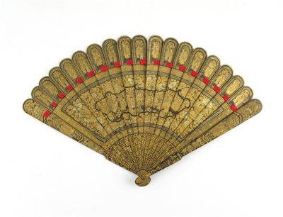 Appraisal: A Chinese lacquer fan decorated in gilt with shaped panels