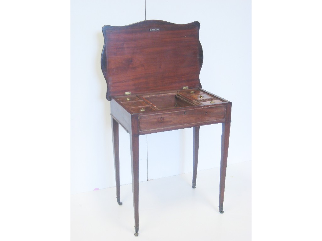 Appraisal: A George III mahogany Work Table with serpentine shape hinged