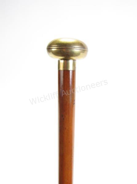 Appraisal: Breech Loading Dress Cane segmented wooden shaft is pulled open