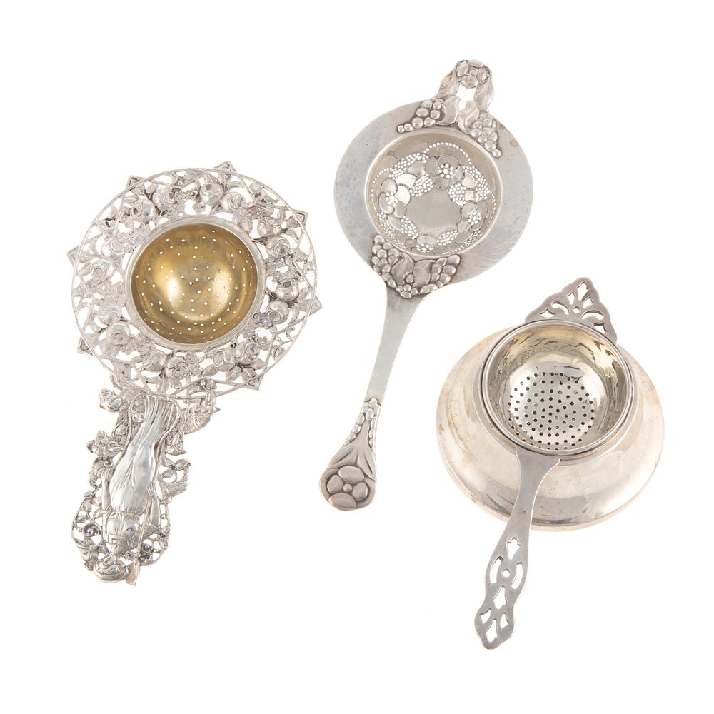 Appraisal: Three Silver Tea Strainers Including sterling George VI by Barker