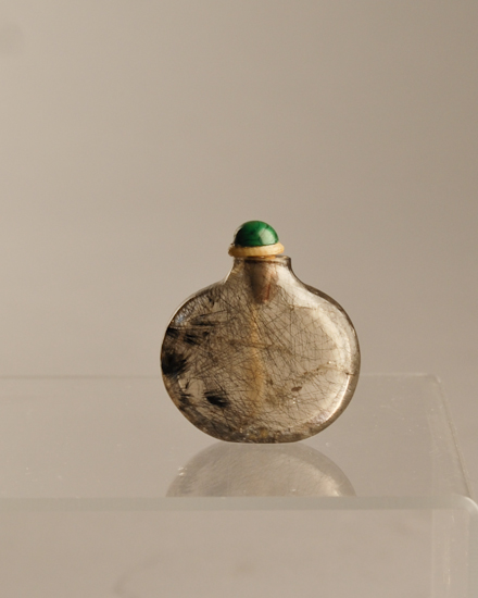 Appraisal: A th C Rutilated Quartz Snuff Bottle a flattened round