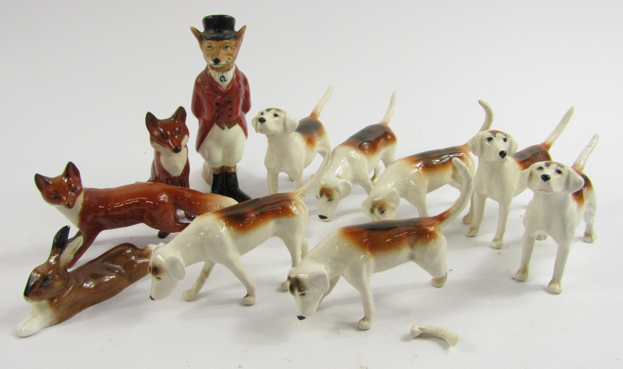 Appraisal: A Royal Doulton recumbent hare HN Huntsman Fox seated and