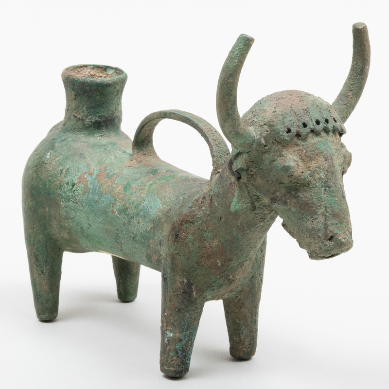 Appraisal: LARGE AND RARE LURISTAN BRONZE COW VESSEL Together with a