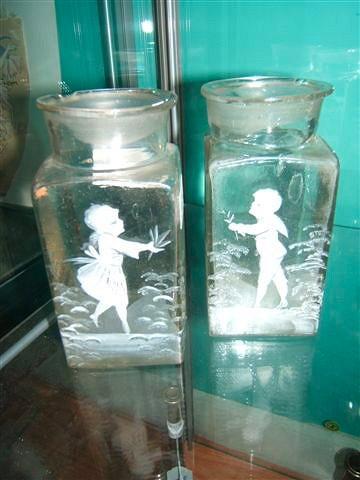 Appraisal: A pair of Mary Gregory style clear glass jars one