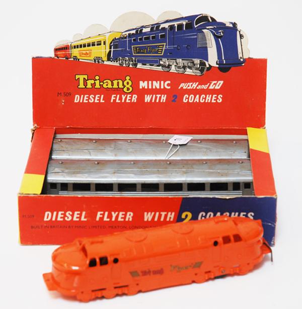 Appraisal: TRIANG M DIESEL FLYER WITH COACHES PLASTIC IN ORIGINAL BOX