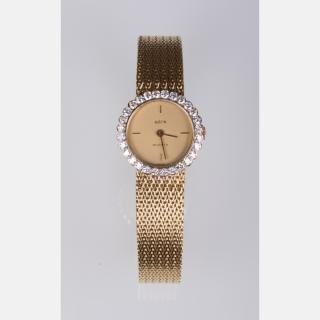 Appraisal: An Austin Quartz kt Yellow Gold and Diamond Ladies Wrist